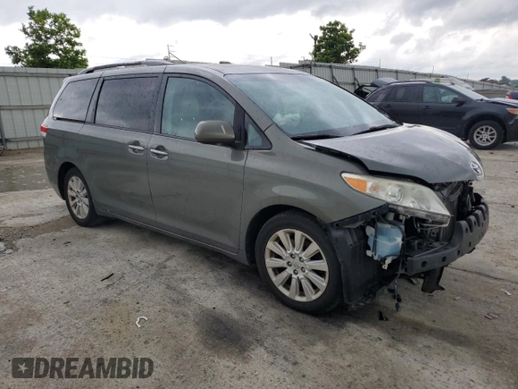2011 Toyota Sienna XLE AAS with VIN 5TDYK3DC9BS120799, listed as a Copart auction lot 61470045 with 194,422 mi miles and Salvage title. Bid and sale history available at DreamBid. Image 4.