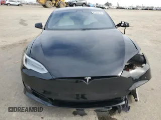 2020 Tesla Model S Performance with VIN 5YJSA1E49LF390948, listed as a Copart auction lot 47313715 with 95,143 mi miles and Salvage title. Bid and sale history available at DreamBid. Image 5.