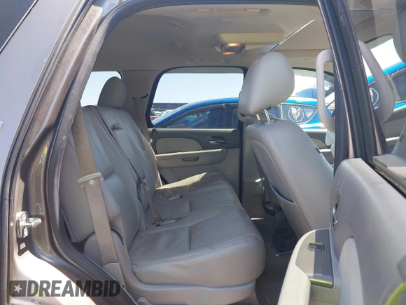 2013 Chevrolet Tahoe LT with VIN 1GNSKBE09DR325729, listed as a IAAI auction lot 41989587 with 186,361 mi miles and . Bid and sale history available at DreamBid. Image 8.
