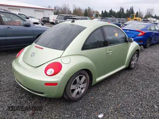 2006 Volkswagen New Beetle Coupe with VIN 3VWRW31C06M402944, listed as a IAAI auction lot 41858922 with 97,518 mi miles. Bid and sale history available at carsss.com. Image 4.
