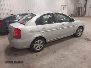 2006 Hyundai Accent GLS with VIN KMHCN46C06U004764, listed as a IAAI auction lot 41793192 with 182,841 mi miles. Bid and sale history available at carsss.com. Image 4.