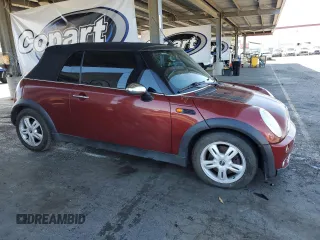 2007 MINI Convertible with VIN WMWRF33537TG17447, listed as a Copart auction lot 59015995 with 137,032 mi miles and Salvage title. Bid and sale history available at DreamBid. Image 4.