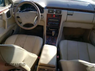 1999 Mercedes-Benz E-Class with VIN WDBJH82F4XX026758, listed as a Copart auction lot 76740804 with 136,782 mi miles and Salvage Title. Bid and sale history available at carsss.com. Image 8.
