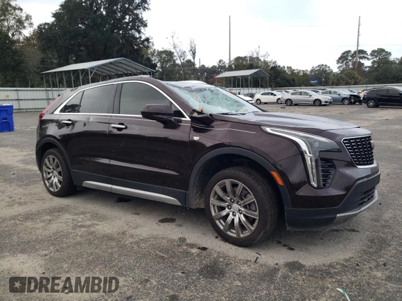 2020 Cadillac XT4 FWD Premium Luxury with VIN 1GYFZCR42LF149030, listed as a Copart auction lot 82671894 with 88,570 mi miles and Salvage title. Bid and sale history available at DreamBid. Image 4.