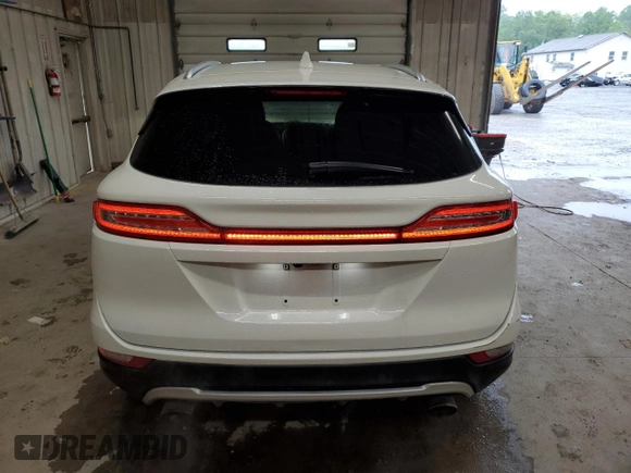 2017 Lincoln MKC Premiere z VIN 5LMCJ1D91HUL51490, wystawiony jako Copart lot #58367225 z przebiegiem 94 861 mil mil oraz Szkoda całkowita • Salvage title. Historia ofert i sprzedaży dostępna na DreamBid. Obrazek 6.