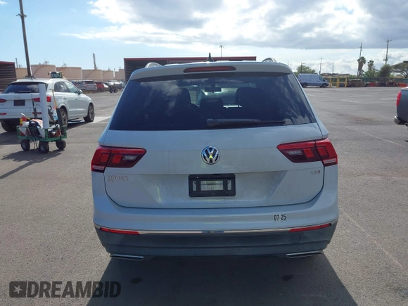 2018 Volkswagen Tiguan SEL z VIN 3VV3B7AX7JM126402, wystawiony jako IAAI lot #42046690 z przebiegiem 54 790 mil mil oraz . Historia ofert i sprzedaży dostępna na DreamBid. Obrazek 16.