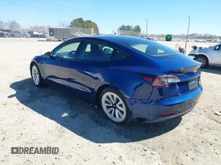 2021 Tesla Model 3 Long Range with VIN 5YJ3E1EB3MF031457, listed as a IAAI auction lot 41630758 with 71,113 mi miles and . Bid and sale history available at carsss.com. Image 3.