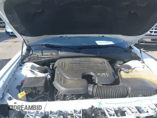2015 Dodge Challenger SXT with VIN 2C3CDZAG3FH861134, listed as a IAAI auction lot 42224973 with 130,157 mi miles and . Bid and sale history available at DreamBid. Image 10.