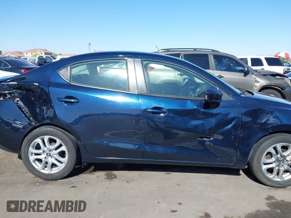 2016 Scion iA with VIN 3MYDLBZV4GY137544, listed as a IAAI auction lot 42137276 with 103,176 mi miles. Bid and sale history available at carsss.com. Image 13.