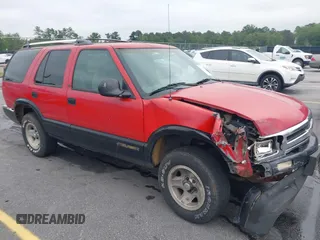 1995 Chevrolet Blazer z VIN 1GNCS13W7S2172327, wystawiony jako IAAI lot #42441948 z przebiegiem 174 250 mil mil oraz . Historia ofert i sprzedaży dostępna na DreamBid. Obrazek 1.