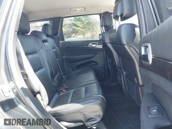 2011 Jeep Grand Cherokee Laredo z VIN 1J4RR4GG9BC519132, wystawiony jako IAAI lot #41931266 z przebiegiem 118 534 mil mil oraz . Historia ofert i sprzedaży dostępna na DreamBid. Obrazek 8.