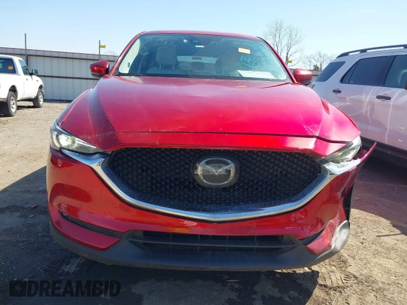 2019 Mazda CX-5 Grand Touring with VIN JM3KFADM5K1556917, listed as a IAAI auction lot 41706323 with 77,804 mi miles. Bid and sale history available at carsss.com. Image 12.