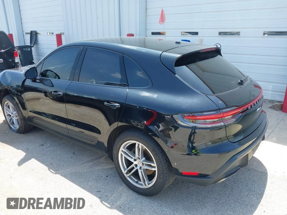 2022 Porsche Macan with VIN WP1AA2A51NLB05822, listed as a IAAI auction lot 39567077 with 54,527 mi miles. Bid and sale history available at carsss.com. Image 3.