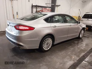 2014 Ford Fusion SE Hybrid с VIN 3FA6P0LU1ER227571, выставлен на аукционе IAAI как лот 42391487 с пробегом 127 979 миль миль и . История ставок и продаж доступна на DreamBid. Изображение 4.