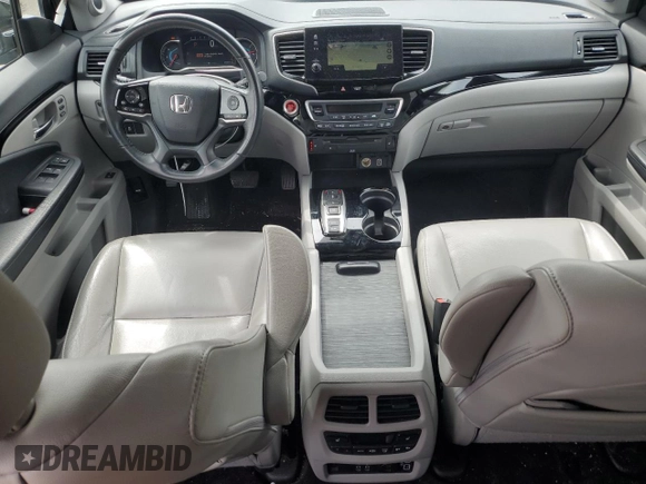 2019 Honda Pilot Touring 8-Passenger z VIN 5FNYF5H91KB033661, wystawiony jako Copart lot #56650155 z przebiegiem 73 512 mil mil oraz Szkoda całkowita • Salvage title. Historia ofert i sprzedaży dostępna na DreamBid. Obrazek 8.