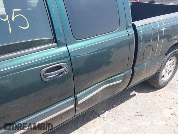 2003 Chevrolet Silverado 1500 with VIN 2GCEC19T531381112, listed as a IAAI auction lot 42144595 with 164,603 mi miles and . Bid and sale history available at DreamBid. Image 6.