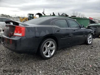 2010 Dodge Charger R/T with VIN 2B3CA5CT3AH172325, listed as a Copart auction lot 50302885 with 257,870 mi miles and Salvage Title. Bid and sale history available at carsss.com. Image 3.