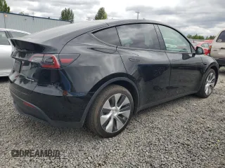 2021 Tesla Model Y Long Range with VIN 5YJYGDEE2MF243763, listed as a Copart auction lot 54941665 with 39,516 mi miles and Clean Title. Bid and sale history available at DreamBid. Image 3.