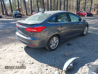 2015 Ford Focus Titanium with VIN 1FADP3J25FL333743, listed as a IAAI auction lot 41857057 with 120,917 mi miles and . Bid and sale history available at carsss.com. Image 4.