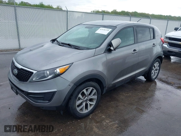 2015 Kia Sportage LX with VIN KNDPB3AC1F7784479, listed as a IAAI auction lot 42124599 with 137,190 mi miles and . Bid and sale history available at carsss.com. Image 2.