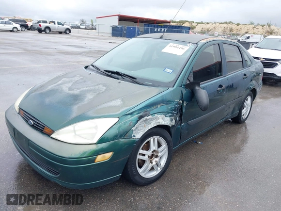 2000 Ford Focus LX with VIN 1FAFP33P8YW336316, listed as a IAAI auction lot 41904496 with 215,100 mi miles and . Bid and sale history available at carsss.com. Image 18.