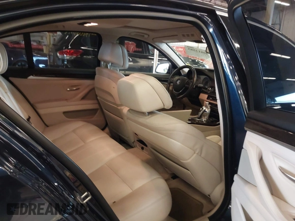 2014 BMW 5 Series 535i with VIN WBA5B1C54ED477539, listed as a IAAI auction lot 40812585 with 94,541 mi miles and . Bid and sale history available at DreamBid. Image 8.