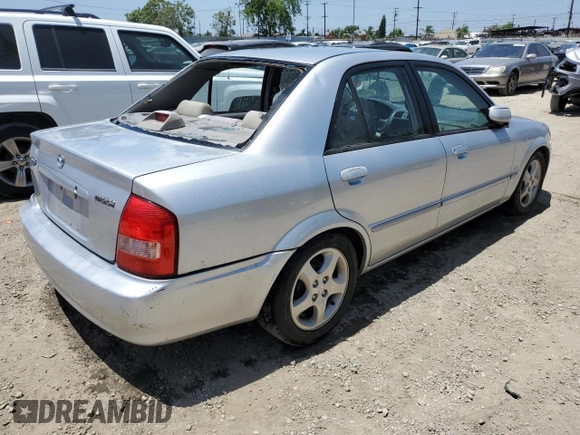 2002 Mazda Protege DX z VIN JM1BJ225920543960, wystawiony jako Copart lot #56336555 z przebiegiem 173 874 mil mil oraz Szkoda całkowita • Salvage title. Historia ofert i sprzedaży dostępna na DreamBid. Obrazek 3.