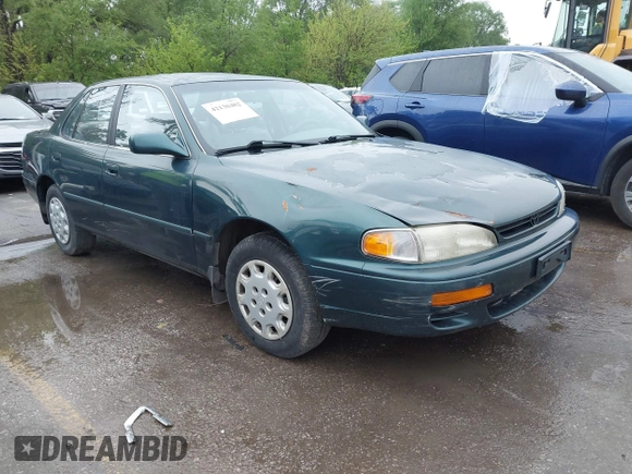 1996 Toyota Camry DX with VIN JT2BG12K5T0346311, listed as a IAAI auction lot 42130482 with 214,872 mi miles. Bid and sale history available at carsss.com. Image 1.