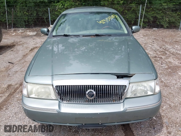 2005 Mercury Grand Marquis LS Premium z VIN 2MHHM75W95X607697, wystawiony jako IAAI lot #42453303 z przebiegiem 142 879 mil mil oraz . Historia ofert i sprzedaży dostępna na DreamBid. Obrazek 6.