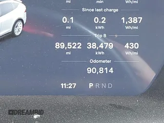 2018 Tesla Model X 75D with VIN 5YJXCBE27JF121834, listed as a IAAI auction lot 41769246 with 90,814 mi miles and . Bid and sale history available at carsss.com. Image 7.