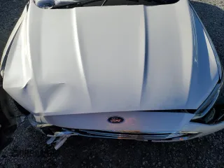 2020 Ford Fusion Hybrid SEL with VIN 3FA6P0MU0LR129742, listed as a Copart auction lot 88924535 with 79,949 mi miles and Salvage Title. Bid and sale history available at carsss.com. Image 11.