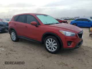 2013 Mazda CX-5 Grand Touring with VIN JM3KE2DE7D0129703, listed as a Copart auction lot 46620955 with 124,228 mi miles and Salvage Title. Bid and sale history available at carsss.com. Image 4.