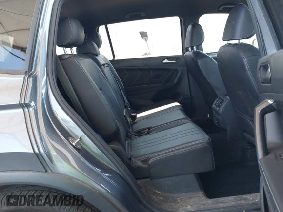 2022 Volkswagen Tiguan SE R-Line Black with VIN 3VVCB7AX8NM039730, listed as a IAAI auction lot 42313651 with 71,759 mi miles and . Bid and sale history available at DreamBid. Image 8.