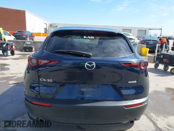 2021 Mazda CX-30 Select with VIN 3MVDMABL5MM272418, listed as a IAAI auction lot 41783355 with 25,429 mi miles and . Bid and sale history available at DreamBid. Image 17.