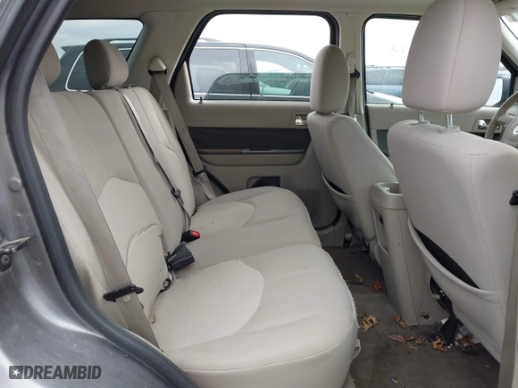 2009 Mercury Mariner with VIN 4M2CU91G49KJ05721, listed as a IAAI auction lot 41919006 with 105,537 mi miles. Bid and sale history available at carsss.com. Image 8.