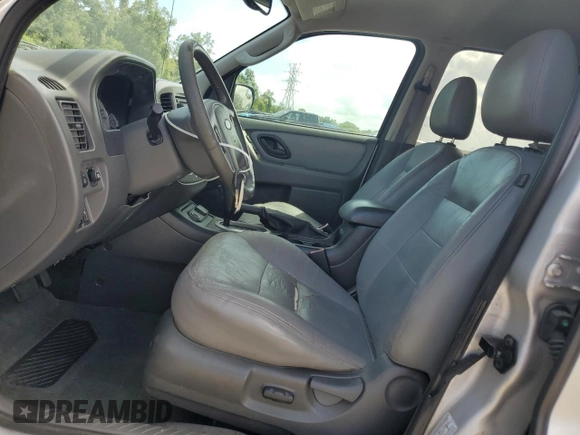 2006 Ford Escape Hybrid z VIN 1FMCU96H36KA35403, wystawiony jako Copart lot #65374705 z przebiegiem 127 689 mil mil oraz Czysty tytuł • Clean title. Historia ofert i sprzedaży dostępna na DreamBid. Obrazek 7.