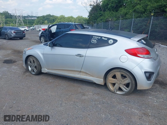 2013 Hyundai Veloster Turbo with VIN KMHTC6AE1DU177023, listed as a IAAI auction lot 42604617 with 102,087 mi miles and . Bid and sale history available at DreamBid. Image 3.