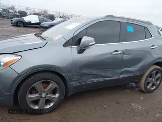 2014 Buick Encore with VIN KL4CJASB9EB624237, listed as a IAAI auction lot 41177399 with 133,261 mi miles. Bid and sale history available at carsss.com. Image 6.