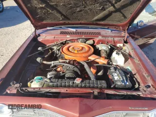 1974 Dodge Dart z VIN LH23C4G110284, wystawiony jako Copart lot #79896194 z przebiegiem 63 067 mil mil oraz Szkoda całkowita • Salvage title. Historia ofert i sprzedaży dostępna na DreamBid. Obrazek 11.