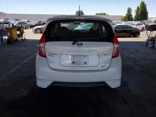 2015 Nissan Note S Plus with VIN 3N1CE2CP7FL435521, listed as a Copart auction lot 64794875 with 60,474 mi miles and Clean title. Bid and sale history available at DreamBid. Image 6.