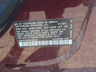 2013 Volkswagen Passat SEL Premium z VIN 1VWCP7A39DC052321, wystawiony jako IAAI lot #41694214 z przebiegiem 151 931 mil mil oraz . Historia ofert i sprzedaży dostępna na DreamBid. Obrazek 9.