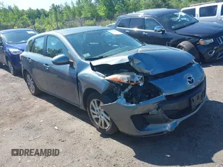 2012 Mazda 3 i Grand Touring z VIN JM1BL1M87C1661500, wystawiony jako IAAI lot #42371851 z przebiegiem 130 118 mil mil oraz . Historia ofert i sprzedaży dostępna na DreamBid. Obrazek 1.