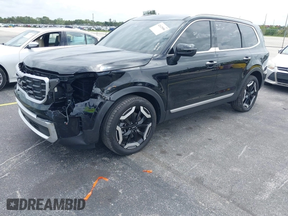 2025 Kia Telluride S with VIN 5XYP6DGC8SG590319, listed as a IAAI auction lot 42625086 with 14,392 mi miles and . Bid and sale history available at DreamBid. Image 2.