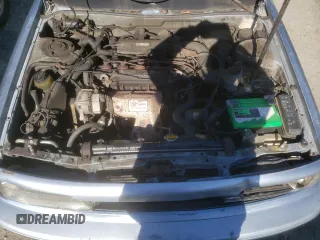 1991 Toyota Camry DLX z VIN 4T1SV21E2MU451022, wystawiony jako Copart lot #45333385 z przebiegiem 229 058 mil mil oraz Szkoda całkowita • Salvage title. Historia ofert i sprzedaży dostępna na DreamBid. Obrazek 12.