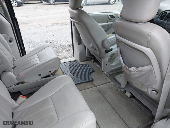 2006 Dodge Grand Caravan SXT with VIN 2D4GP44L16R616863, listed as a IAAI auction lot 41927585 with 999,999 mi miles. Bid and sale history available at carsss.com. Image 8.