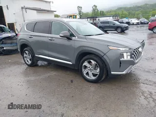 2022 Hyundai Santa Fe XRT z VIN 5NMS6DAJ3NH411101, wystawiony jako IAAI lot #42315193 z przebiegiem 60 103 mil mil oraz . Historia ofert i sprzedaży dostępna na DreamBid. Obrazek 1.