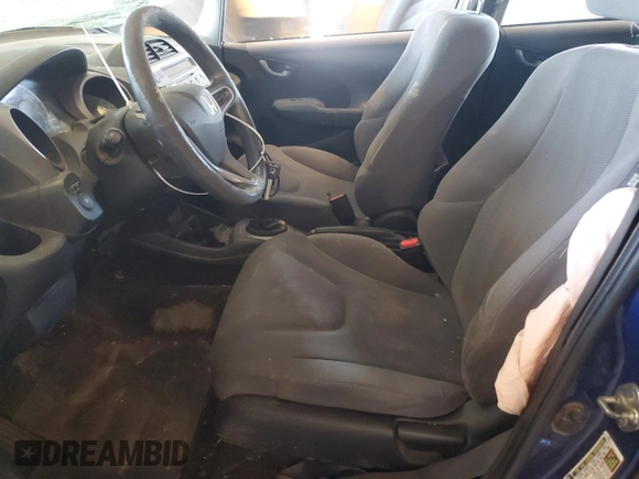 2009 Honda Fit with VIN JHMGE872X9S036722, listed as a Copart auction lot 64701315 with 197,305 mi miles and Non repairable. Bid and sale history available at DreamBid. Image 7.