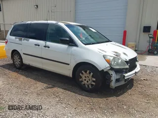 2007 Honda Odyssey LX with VIN 5FNRL38227B072027, listed as a IAAI auction lot 42676613 with 309,603 mi miles and . Bid and sale history available at DreamBid. Image 1.