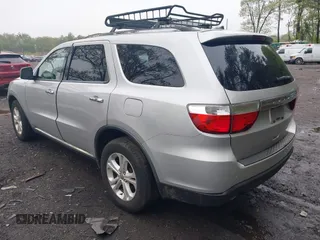 2013 Dodge Durango Crew with VIN 1C4SDJDT8DC565608, listed as a IAAI auction lot 42181773 with 161,485 mi miles and . Bid and sale history available at DreamBid. Image 3.