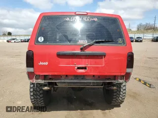1999 Jeep Cherokee Sport with VIN 1J4FF68S6XL574980, listed as a Copart auction lot 51639635 with 257,854 mi miles and Salvage Title. Bid and sale history available at carsss.com. Image 6.